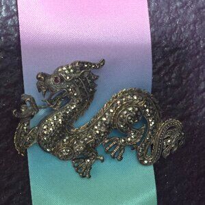 VINTAGE CREATIONS ASIAN DRAGON STERLING SILVER MARCASITE RUBY EYE BROOCH